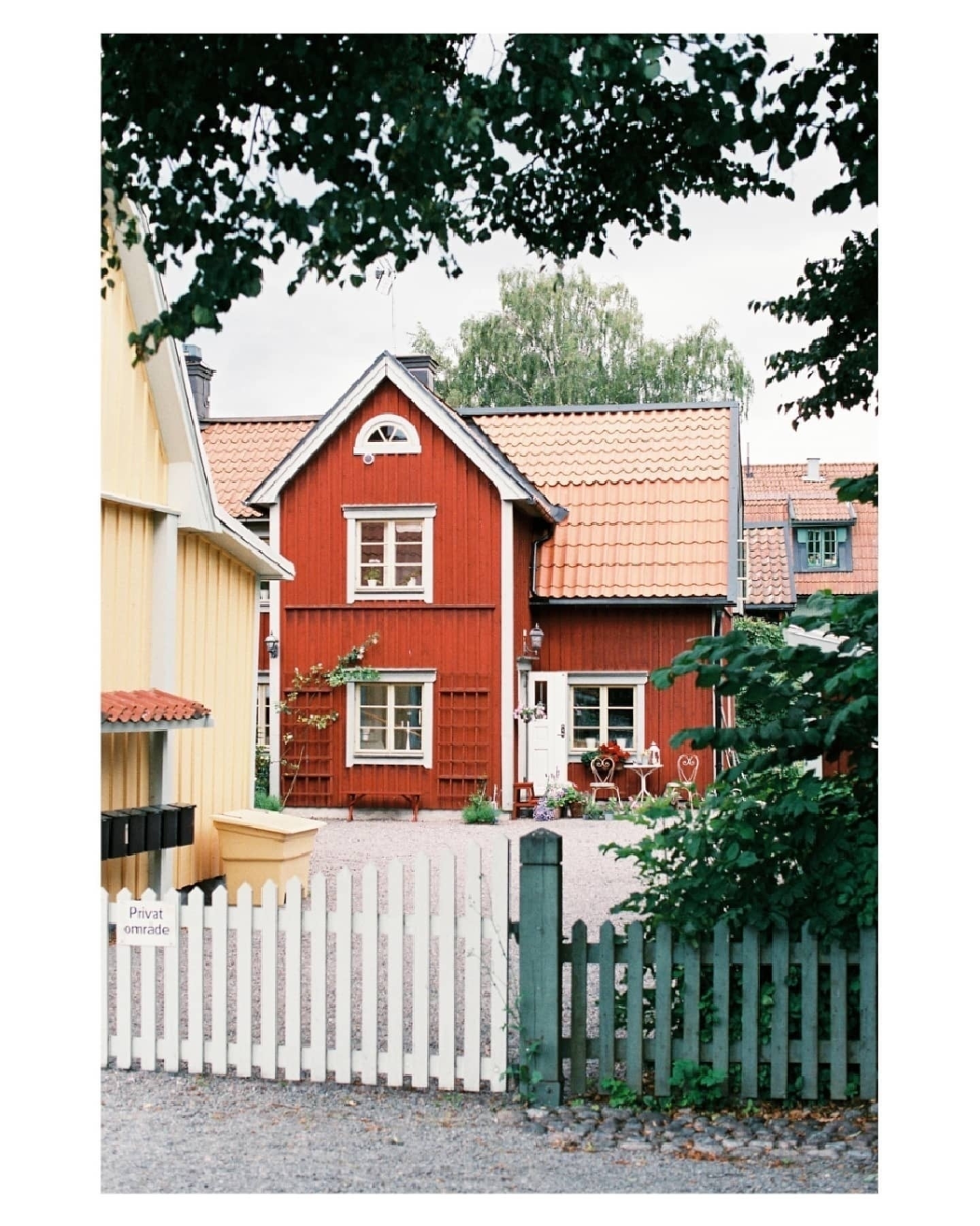 A charming red wooden house