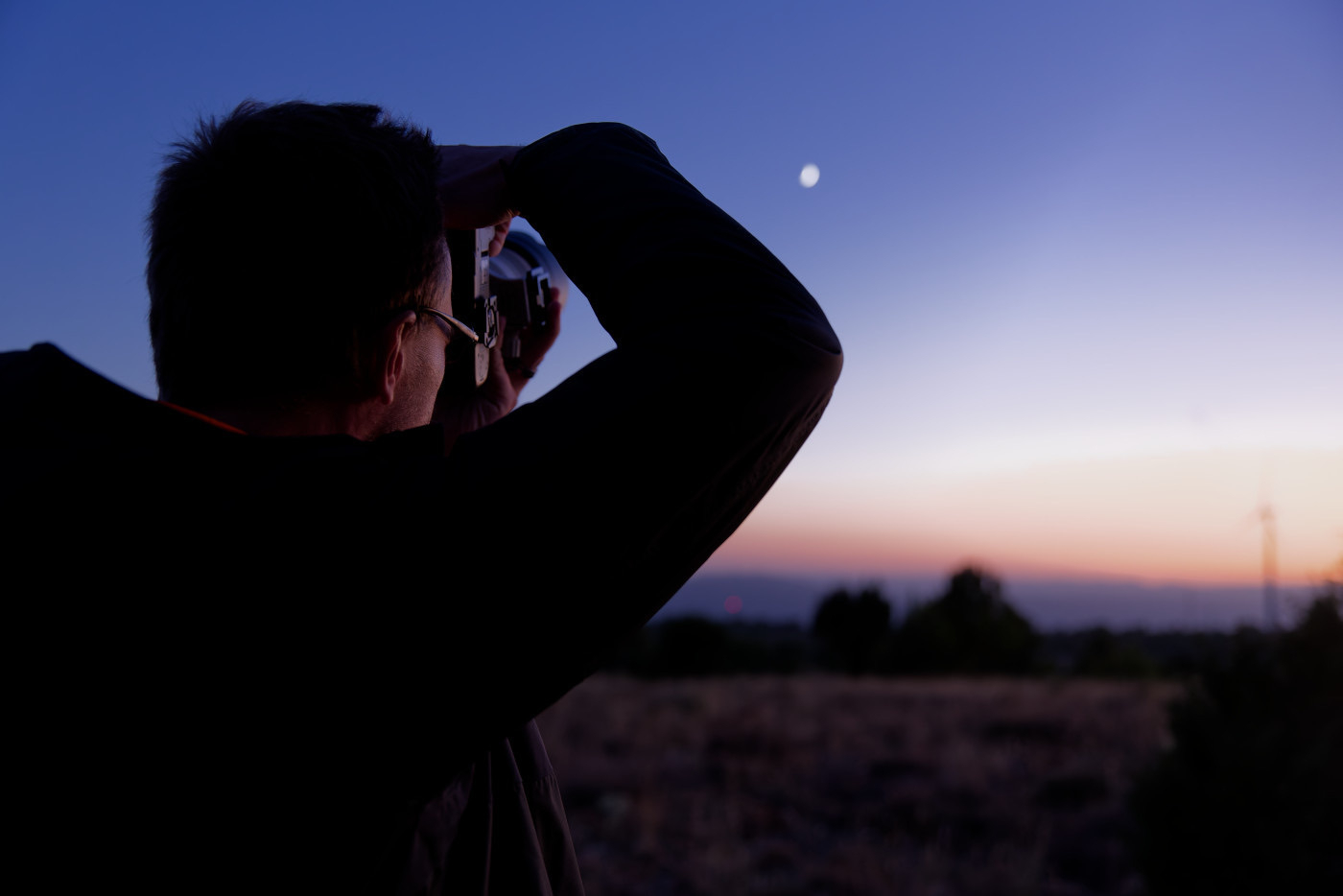 The sky with the moon shining.